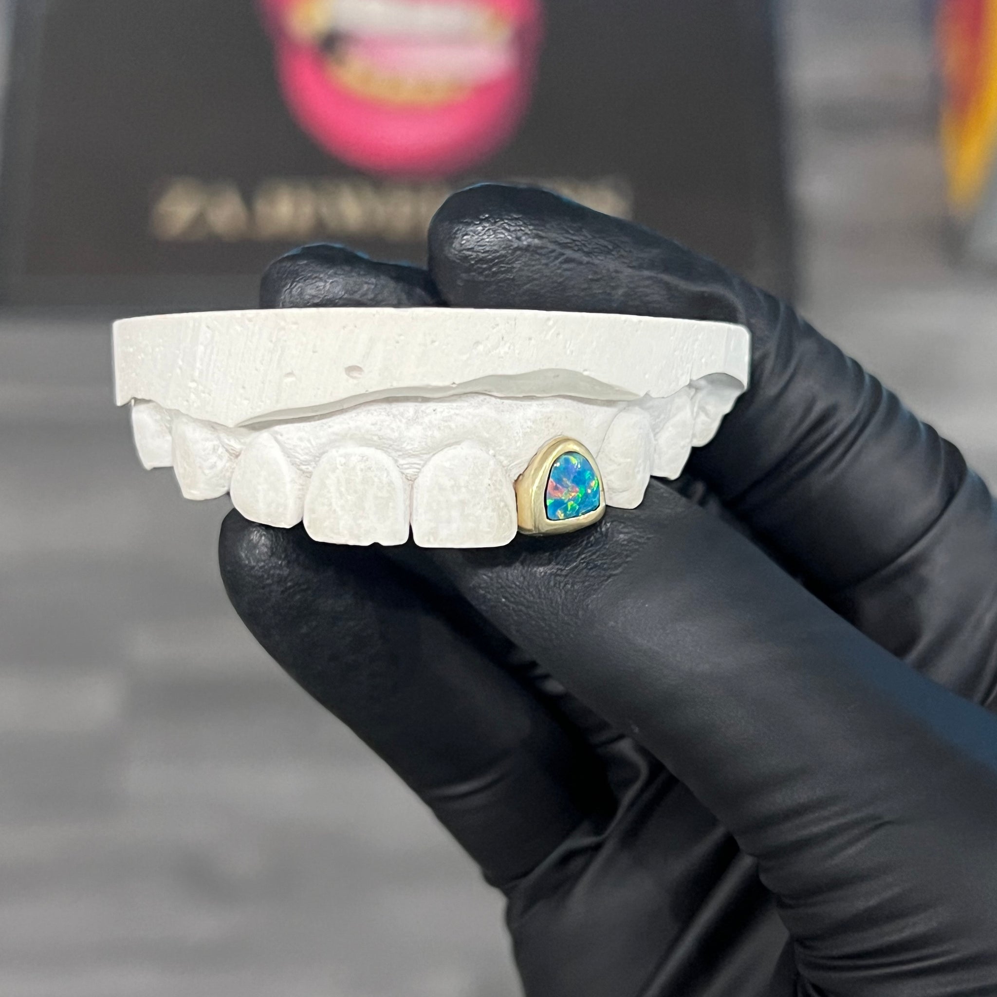 Single opal tooth