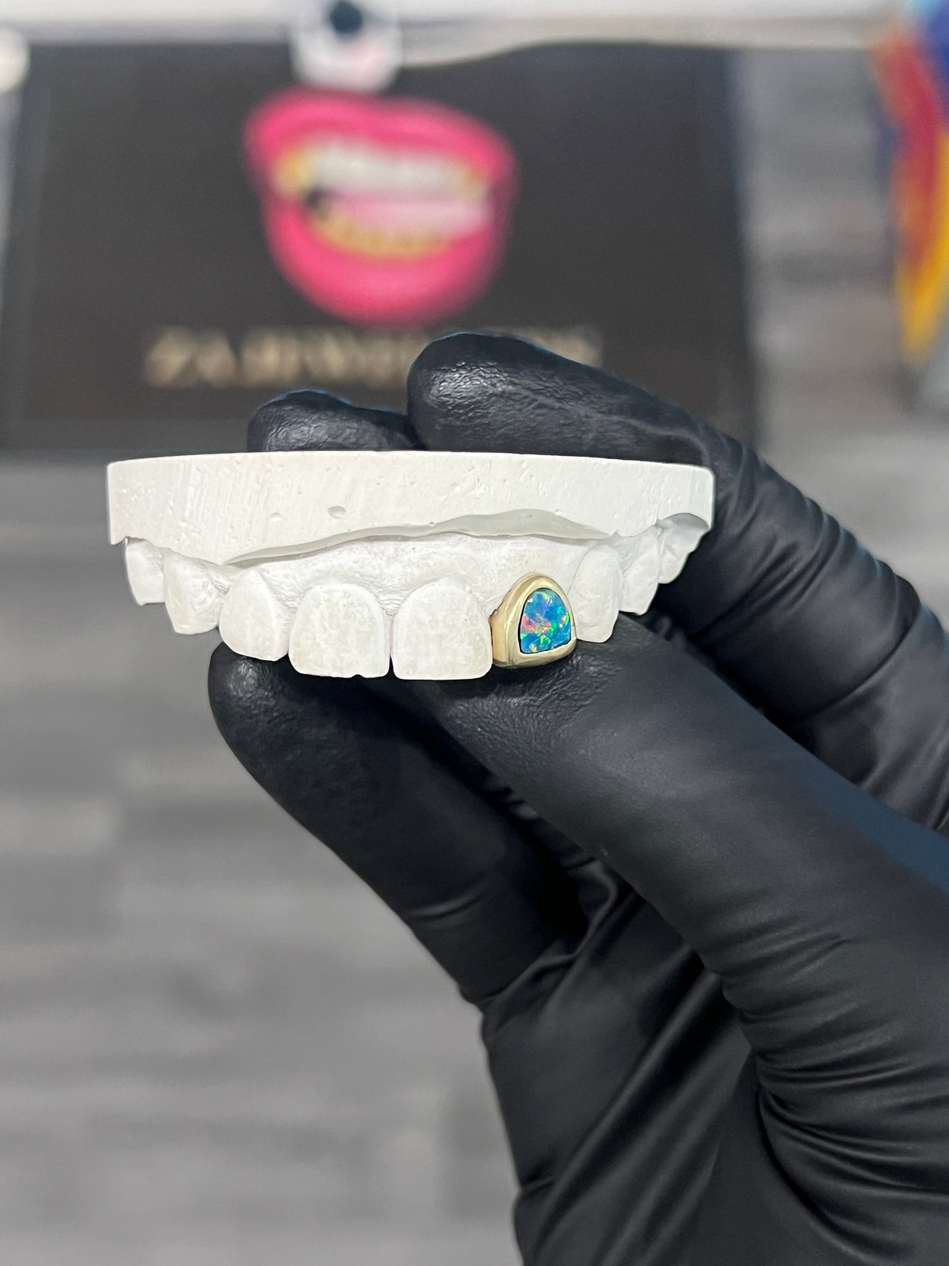 Single opal tooth