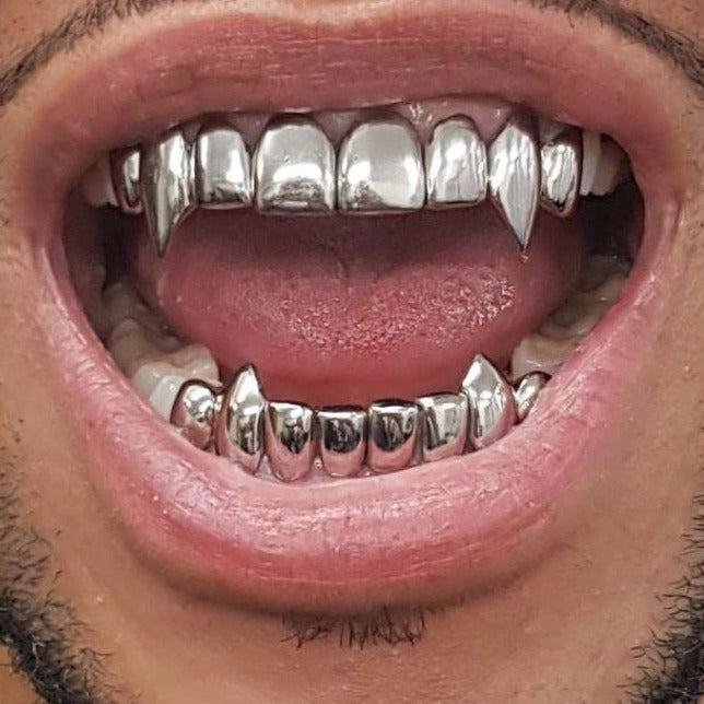 Vampire Eight (8) Set of Grillz ***LONG SHARP FANGS***